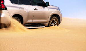 close up golden car stuck sand namib desert africa -